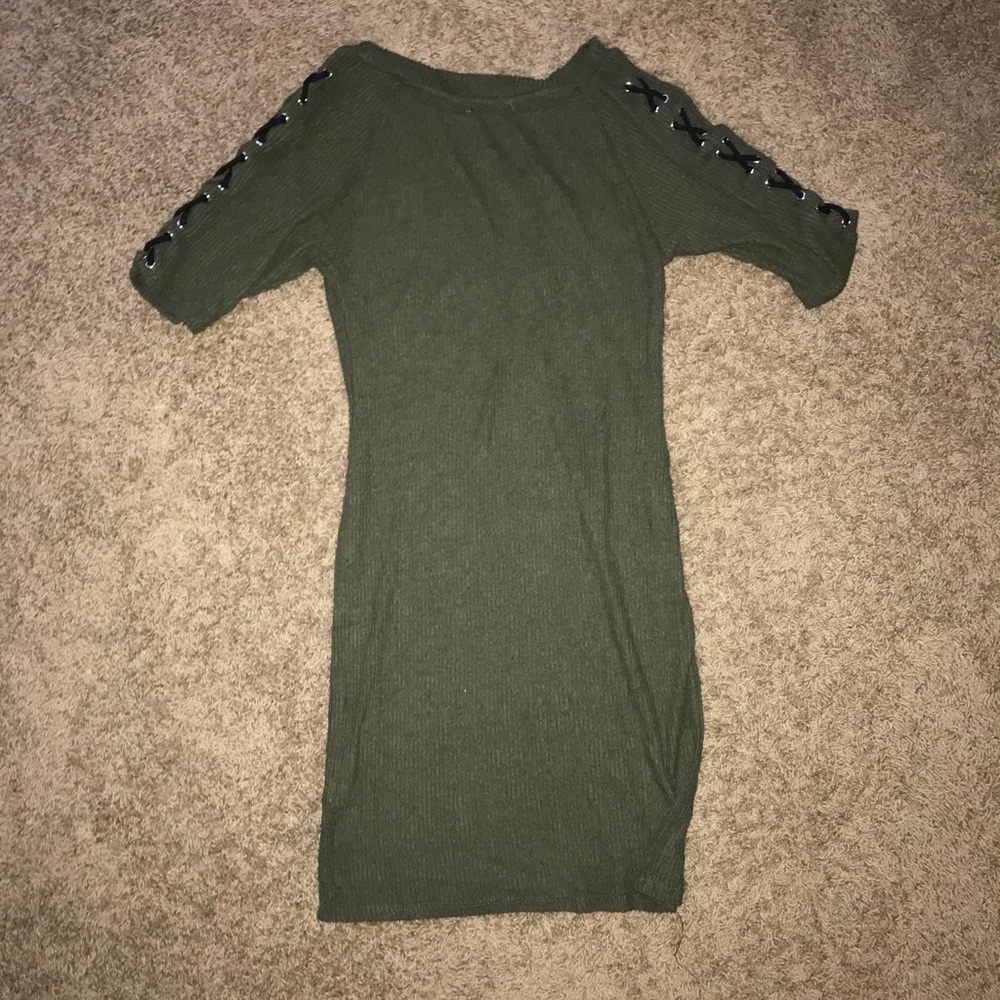 Green dress with black cross crossing